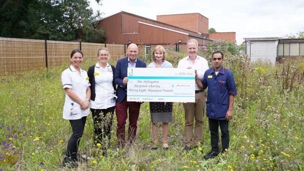 Mills Ltd CEO Jerry Mills visits Hillingdon Hospital to deliver the £38k cheque.